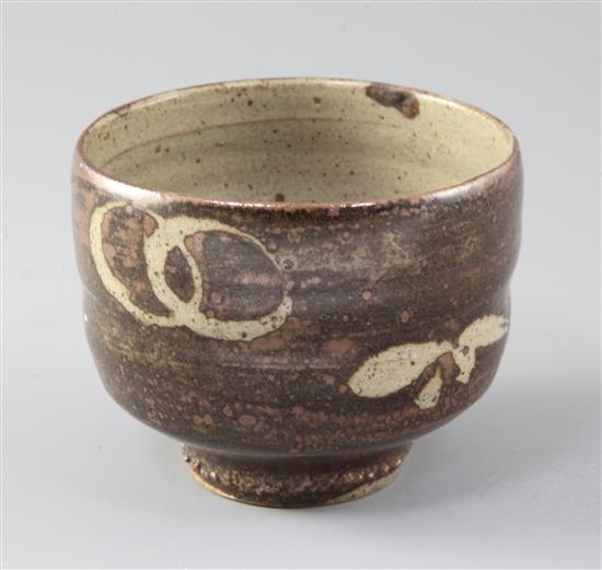 Manner of Shoji Hamada. A Studio pottery cup, diameter 11cm, restored chip